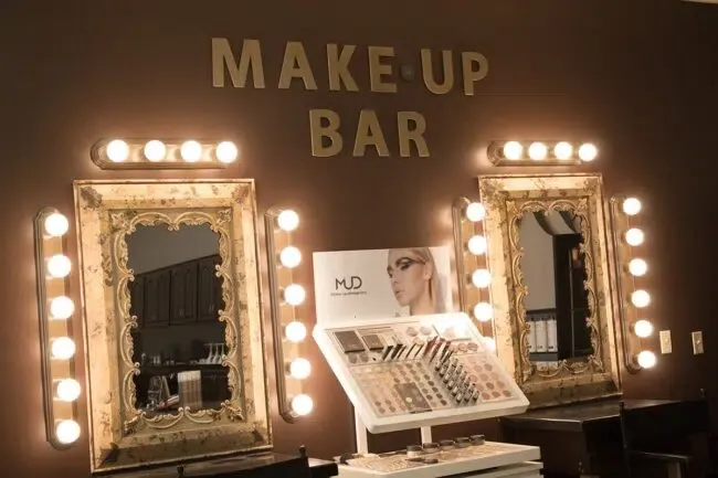 The Salina MAKE-UP BAR — lit mirrors and a full pro palette